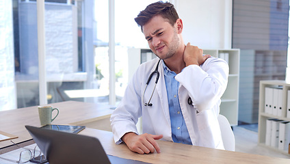 Image showing Man, doctor and laptop with neck pain, ache or tension sitting by office desk in stress or discomfort at hospital. Healthcare male suffering holding painful area from work injury, bruise or sore