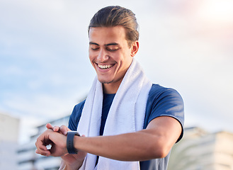 Image showing Happy, smartwatch and man checking fitness, health and cardio progress while training in a city. Digital, heartbeat and pulse tracker for guy runner outdoor for performance, monitor and exercise app
