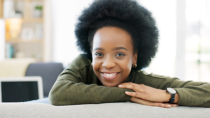 Image showing Face of a happy afro woman relaxing indoors on the weekend. Beautiful, cheerful and carefree African American girl having a stressless day at home relaxing in her modern bright living room apartment