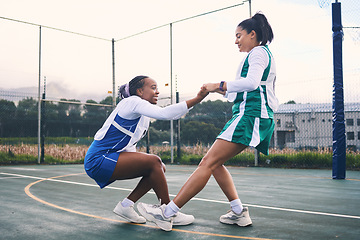 Image showing Netball help, support and outdoor game of team sports with fitness and exercise. Helping, sportsmanship and student women with teamwork and collaboration in a sport competition with happiness