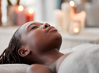 Image showing Black woman sleep, peace and luxury spa face treatment of young female ready for facial. Skincare, beauty and wellness clinic candles with client feeling calm and zen before massage or chemical peel