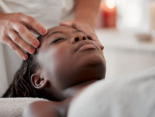 Image showing Black woman, face massage and luxury spa treatment of a young female ready for facial. Skincare, beauty and wellness clinic with client feeling calm and zen for collagen and chemical peel at salon