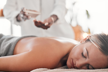 Image showing Woman, spa and luxury back massage on table for health, zen and wellness of body. Client with a masseuse for healing, relax and therapy with self care and cosmetic service for detox and holistic time