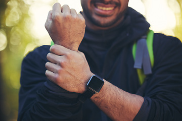 Image showing Man, hands or pain in hiking forest, nature woods or trees environment in muscle crisis, anatomy problem or healthcare stress. Zoom, medical or wrist injury emergency for athlete, hiker or backpacker