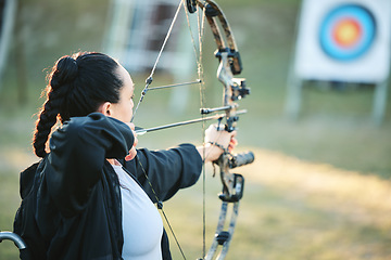 Image showing Archery woman, target and bow and arrow training for outdoor sports, athlete challenge or girl field competition. Shooting goals, talent and competitive archer focus on precision, aim or objective