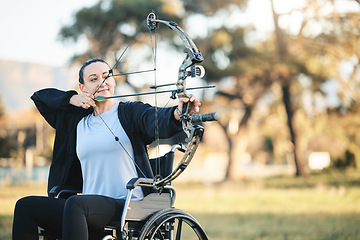 Image showing Disabled sports woman, outdoor archery in wheelchair and challenge with active lifestyle in Canada. Person with disability in a park, fitness activity to exercise arms and aim arrow for hobby