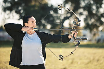 Image showing Happy person, bow or arrows aim in sports field, shooting range or gaming nature in hunting, hobby or exercise. Archery, woman or athlete smile with weapon in target training, competition or practice