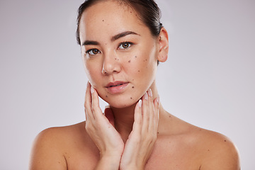Image showing Asian woman, face beauty and skincare portrait in studio for dermatology cosmetic and skin glow. Aesthetic model person with hand for makeup shine and luxury facial self care on grey background