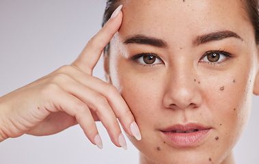 Image showing Face portrait, skincare and beauty of woman in studio isolated on a gray background. Makeup, natural cosmetics and young female model with glowing, healthy or flawless skin after spa facial treatment