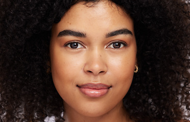 Image showing Portrait, beauty and afro with a model black woman in studio for skincare, haircare or cosmetics. Face, hair and natural with an attractive young female posing for skin treatment or antiaging care