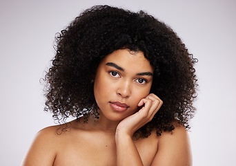 Image showing Dermatology, beauty and portrait of black woman with hand on face, afro and advertising luxury makeup product promo. Skincare, cosmetics and facial skin care on model isolated on studio background.