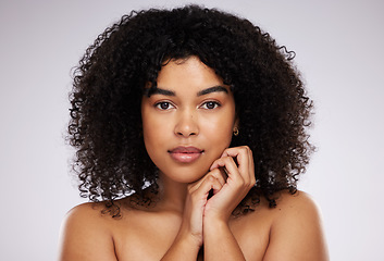 Image showing Beauty, skincare and portrait of a black woman with cosmetics isolated on a grey studio background. Serious, young and face of a model with a fresh afro, cosmetology and elegant on a backdrop