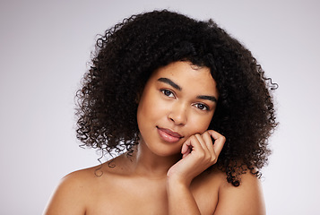 Image showing Black woman, beauty and face, skincare portrait and natural cosmetics, hair care and glow on studio background. Hand, skin and wellness with dermatology, cosmetic and makeup with African female