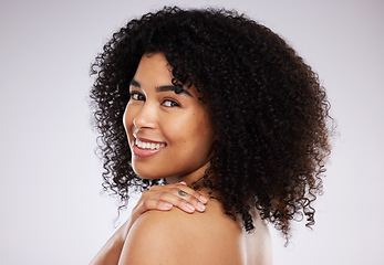 Image showing Black woman, smile and afro in studio portrait with beauty, wellness and cosmetic skincare glow by background. Young gen z model, african and hair care with clean face, natural and healthy aesthetic
