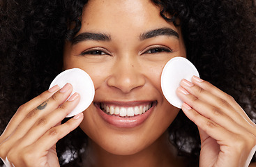 Image showing Smile, cotton pad and portrait of black woman for wellness, luxury spa and natural glow in studio. Dermatology, skincare and face zoom of happy girl with swab for makeup, cosmetic and facial cleaning