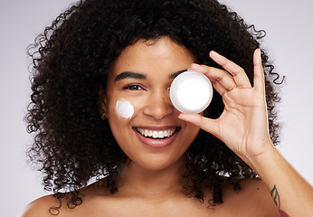 Image showing Skincare, cream product and portrait of black woman for beauty, wellness and healthy skin in studio. Dermatology, luxury spa and girl with face moisturizer for makeup, cosmetics and facial treatment