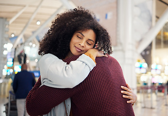 Image showing Couple, hug and smile in goodbye at airport for travel, trip or flight in farewell for long distance relationship. Man and woman hugging before traveling, departure or immigration waiting for airline