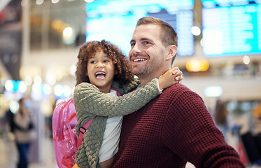 Image showing Family, father and kid hug at airport, travel and girl with man excited for flight, happiness and love and ready at terminal. Happy, care and bond with smile, backpack and vacation with transport