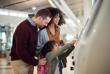 Image showing Self service, technology and travel with mixed family in airport for check in, vacation and global. Passport, digital and smile with parents and child for holiday, flight and ticket information