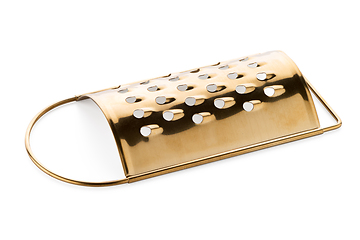 Image showing Golden colored metal scraper