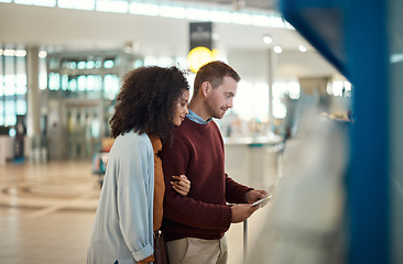 Image showing Payment, airport and couple with ticket for self service, checkout or online booking on machine. Paying, man and woman happy, hug and bonding while at POS for flight schedule, travel and information