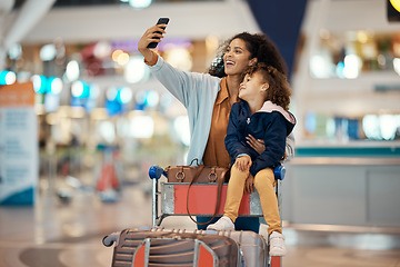 Image showing Travel, selfie and smile with mother and daughter in airport for social media, holiday and global journey. Smile, luggage and phone with mom and child picture for vacation, departure and technology