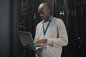 Image showing Laptop, server room and black man or technician in data center management, system or cybersecurity. Analysis, serious or power coding solution, engineering programmer or information technology person