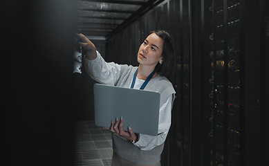 Image showing Laptop, maintenance or IT woman in server room for research, engineer working in data center. Computer, cybersecurity and girl programmer with tech for problem solving, diagnose or troubleshooting