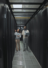 Image showing Laptop, teamwork or IT people in server room for maintenance, analysis or digital innovation. Data center, cybersecurity or man and woman programmer for planning network strategy or system firewall