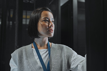 Image showing Serious, maintenance or IT woman in server room for analysis, engineer working in data center. Thinking, cybersecurity and girl programmer with tech for problem solving, diagnose or troubleshooting