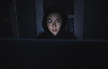 Image showing Night, hacker and cyber security with woman and laptop for coding, software and programming. Ransomware, phishing and developer with girl programmer in server for database, network and digital crimes