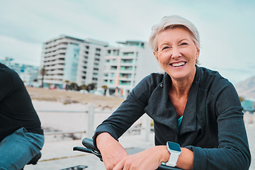 Image showing Mature woman, portrait and electrical bike in future transportation, clean energy or sustainability travel. Technology, electric and bicycle for happy, smile or elderly person in eco friendly cycling