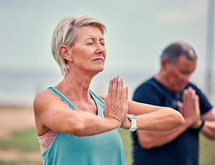 Image showing Yoga, fitness and senior woman in praying hands for spiritual wellness, holistic meditation or retirement health. Calm mind, prayer and elderly couple or personal trainer meditate, namaste and peace