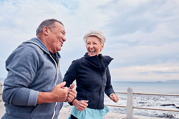 Image showing Running, fitness and senior couple laugh by ocean for exercise, healthy body and wellness in retirement. Sports, marriage and happy elderly man and woman for smile, cardio workout and training by sea