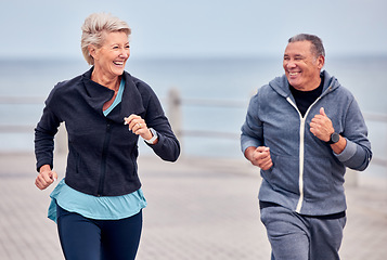 Image showing Fitness, running and happy senior couple by ocean for exercise, healthy body and wellness in retirement. Sports, marriage and elderly man and woman smile for run, cardio workout and training outdoors