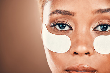 Image showing Eye patch, black woman and portrait for beauty on a mockup background for collagen dermatology. Aesthetic model person face in studio for skincare, cosmetics and facial skin glow with gel mask space