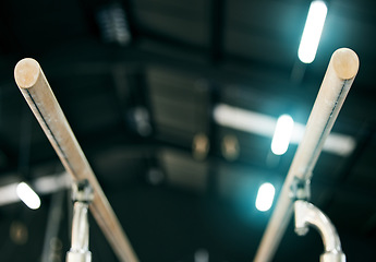 Image showing Gymnastics, balance beams and equipment for training, workout or skill competition at arena. Sports, fitness and wood poles for athletes or gymnasts to practice flexibility or agility at a gym.