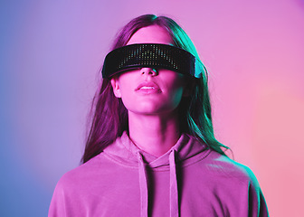 Image showing Vr, metaverse and woman in 3d virtual reality isolated on a background in studio. Futuristic neon, face technology and female with cyber glasses for online gaming, internet browsing or simulation.