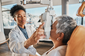 Image showing Eye exam, vision and black woman with patient in optometry clinic for eyesight and optical assessment. Healthcare, optometrist consultation and doctor medical equipment, phoropter and lens for eyes