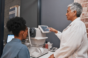 Image showing Digital eye exam, vision and health for eyes, optometry and doctor with patient, eyecare and ophthalmology clinic. Machine, screen and black woman with senior optometrist, service and medical exam