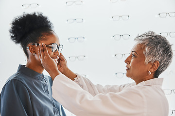 Image showing Optician, vision and black woman shopping for glasses in optometry store or shop for ophthalmology. Doctor, healthcare and female or senior medical ophthalmologist with eyewear or lenses for eye care