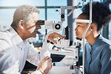 Image showing Test, eye exam or black woman consulting doctor for eyesight at optometrist or ophthalmologist. African customer testing vision with mature optician helping or checking iris or retina visual health