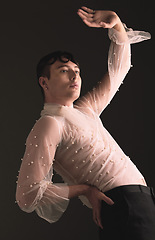 Image showing Gen z fashion, creative pose and vintage aesthetic with retro clothing in studio. Isolated, black background and lgbtq or gay model with woman clothes and creativity for non binary and beauty art