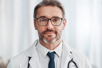 Image showing Healthcare, leadership and portrait of mature doctor, man in hospital for support, pride and help in medical work. Health, wellness and medicine, confident professional with stethoscope and smile.