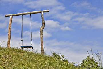 Image showing ordinary wooden swing