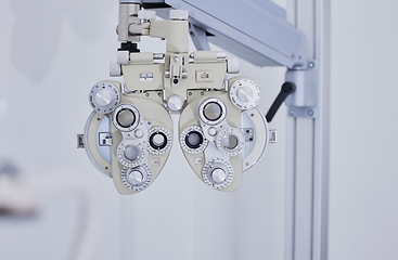 Image showing Phoropter, medical optometry and equipment in hospital for eye test or examination. Vision, healthcare and technology or tools for ophthalmology for eyecare, health and eyesight wellness in clinic.