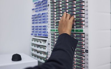 Image showing Optician, hand and vision box storage in retail store, clinic or medical center for prescription lens, contacts or eyewear help. Zoom, woman and eyes optometrist checking stock, shelf or shop order