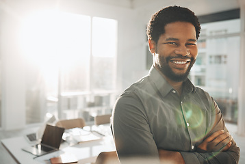 Image showing Business, portrait and smile of black man with arms crossed in office for mission or success mindset. Ceo, boss and face of happy, confident or proud male entrepreneur or professional from Nigeria.