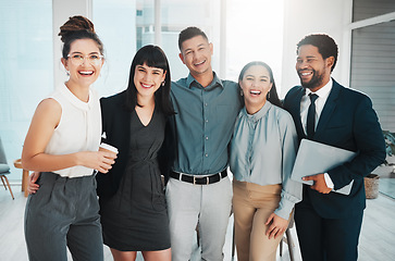 Image showing Happy, group and portrait of laughing business people together for meeting, working and teamwork. Smile, hug and corporate employees in an office for bonding, collaboration and happiness as a team