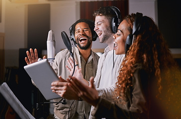 Image showing Team, people in recording studio singing and mic, sound equipment with music and artist, diversity and collaboration. Audio, headphones and musician group with tablet, record label and creativity